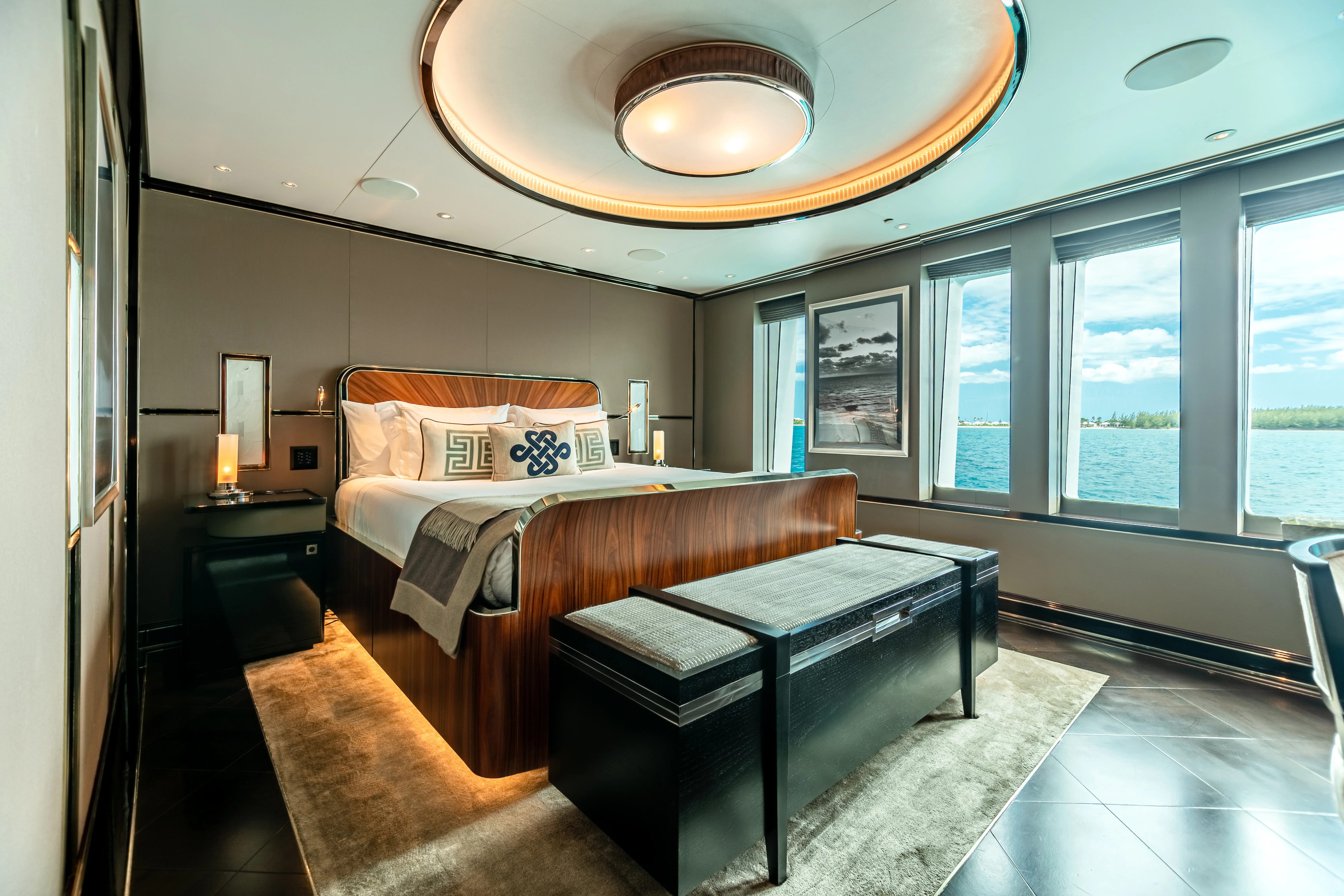 a bedroom with a bed aboard SEALION Yacht for Sale