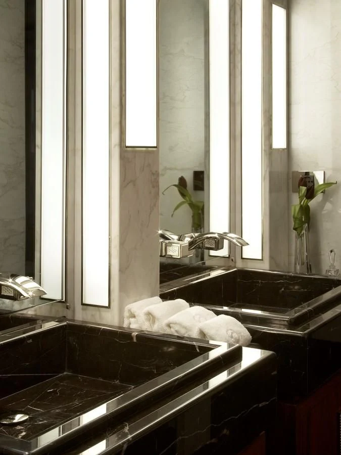 a bathroom with a sink and a large window aboard SEALION Yacht for Sale