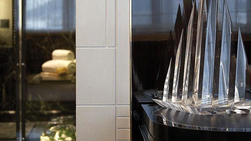 a fountain in a glass case aboard SEALION Yacht for Sale