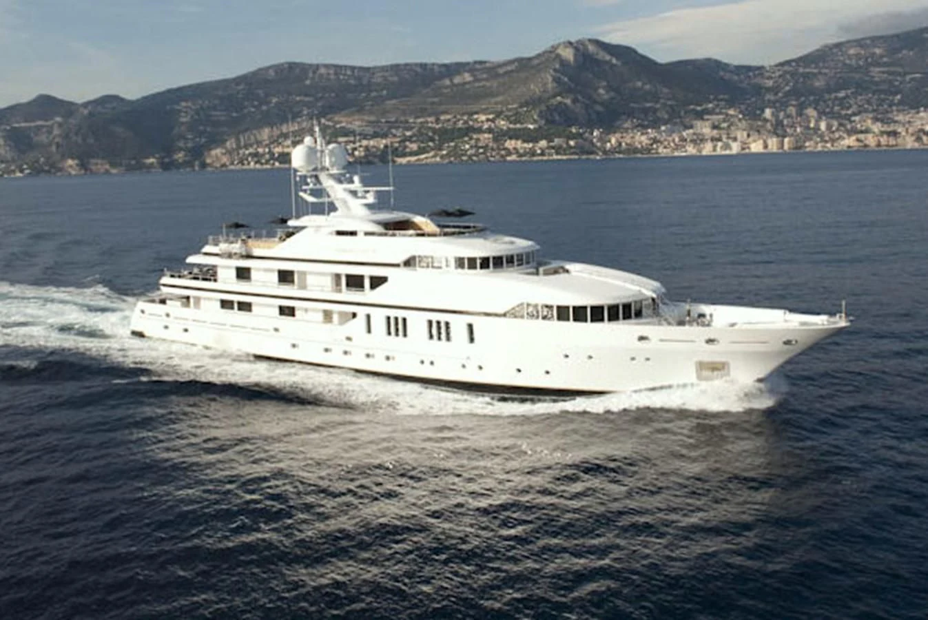 a white yacht in the water aboard SEALION Yacht for Sale