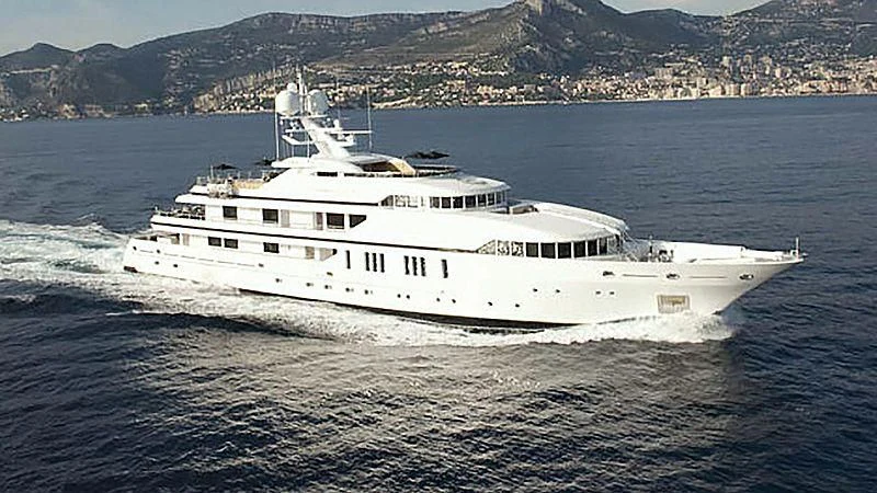 a large white ship in the water aboard SEALION Yacht for Sale