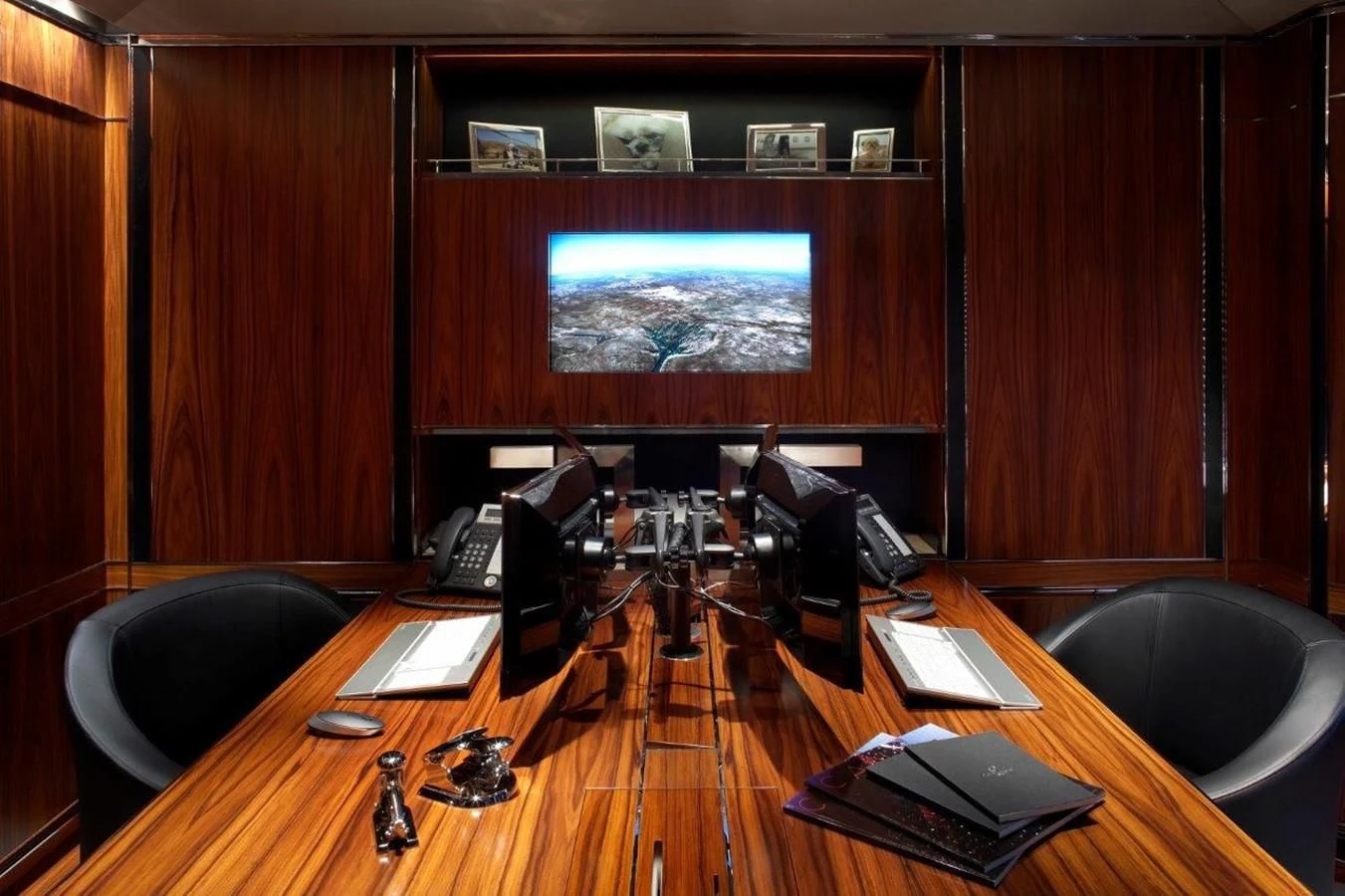 a room with a large screen aboard SEALION Yacht for Sale