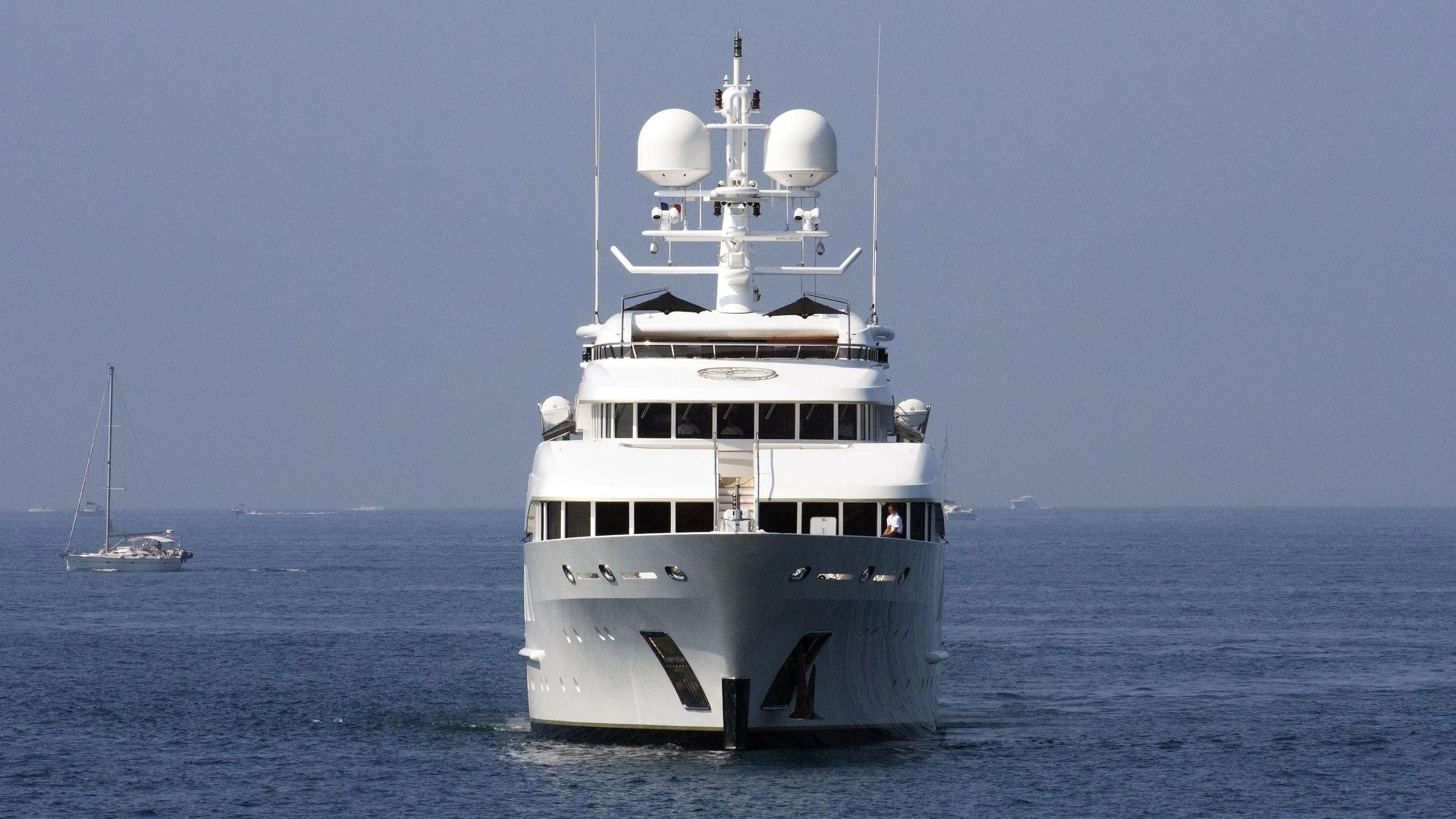 a large white ship in the water aboard SEALION Yacht for Sale