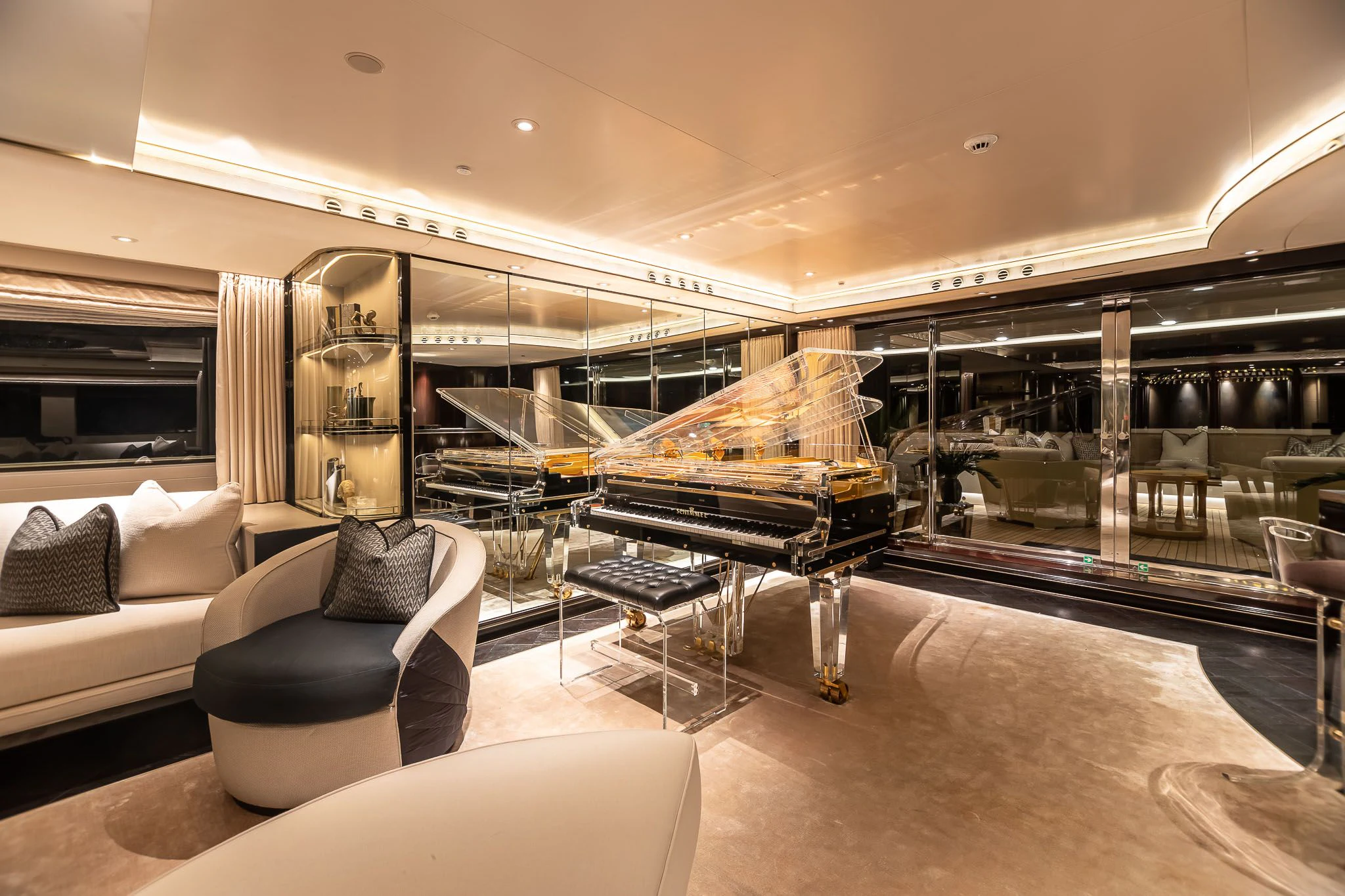 a living room with a large glass wall aboard SEALION Yacht for Sale
