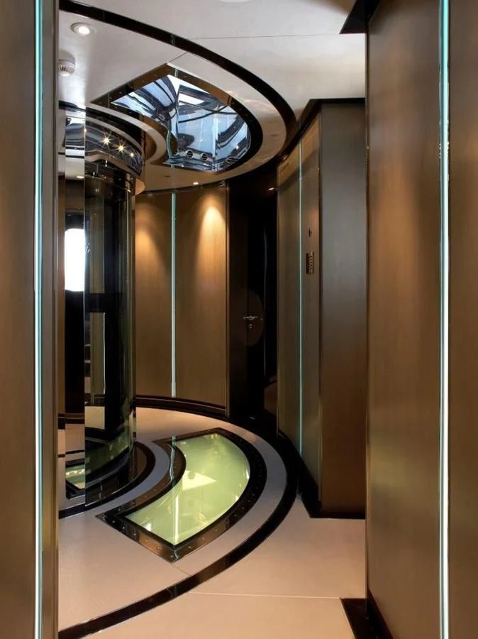 a large room with a large mirror aboard SEALION Yacht for Sale