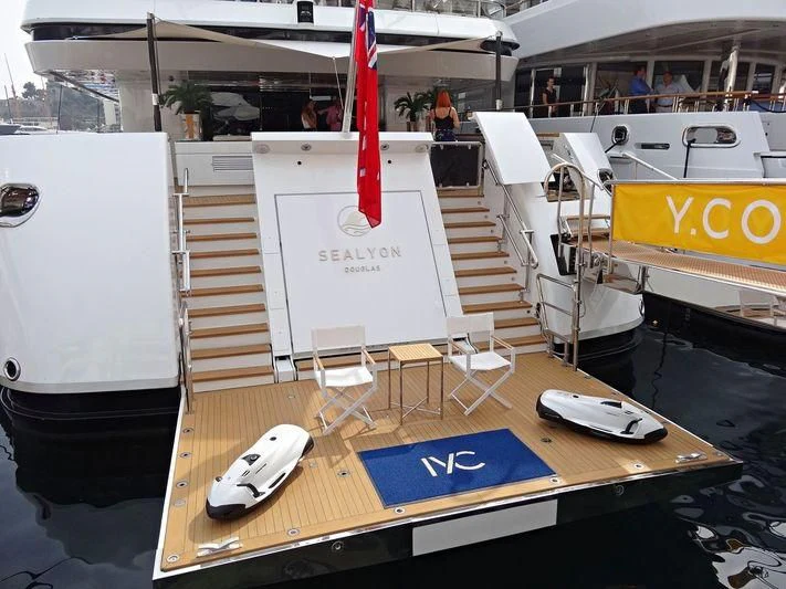 a boat with a table and chairs aboard SEALION Yacht for Sale