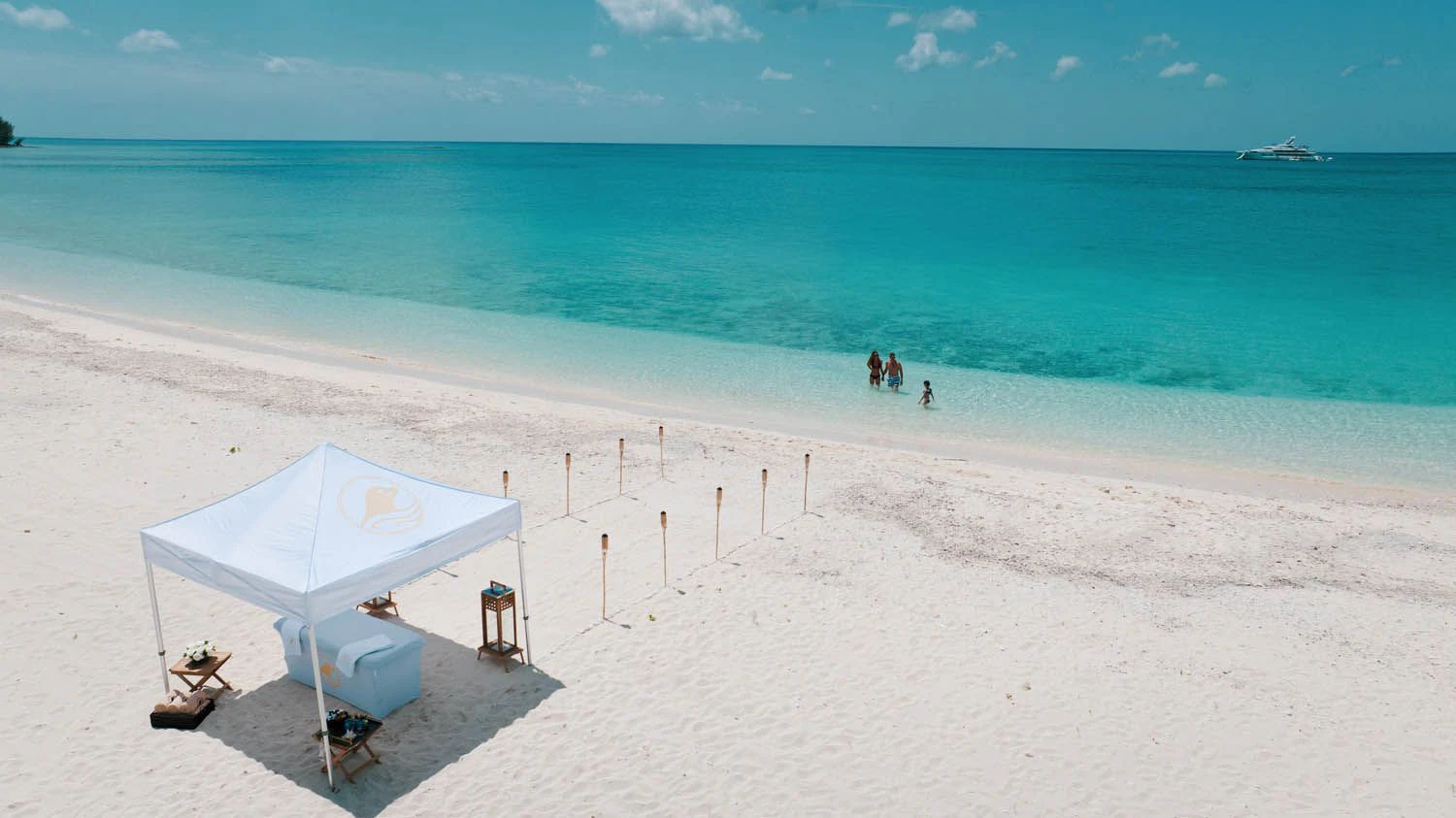 a tent on a beach aboard SEALION Yacht for Sale