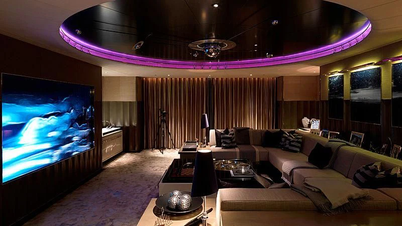 a large room with a large screen aboard SEALION Yacht for Sale