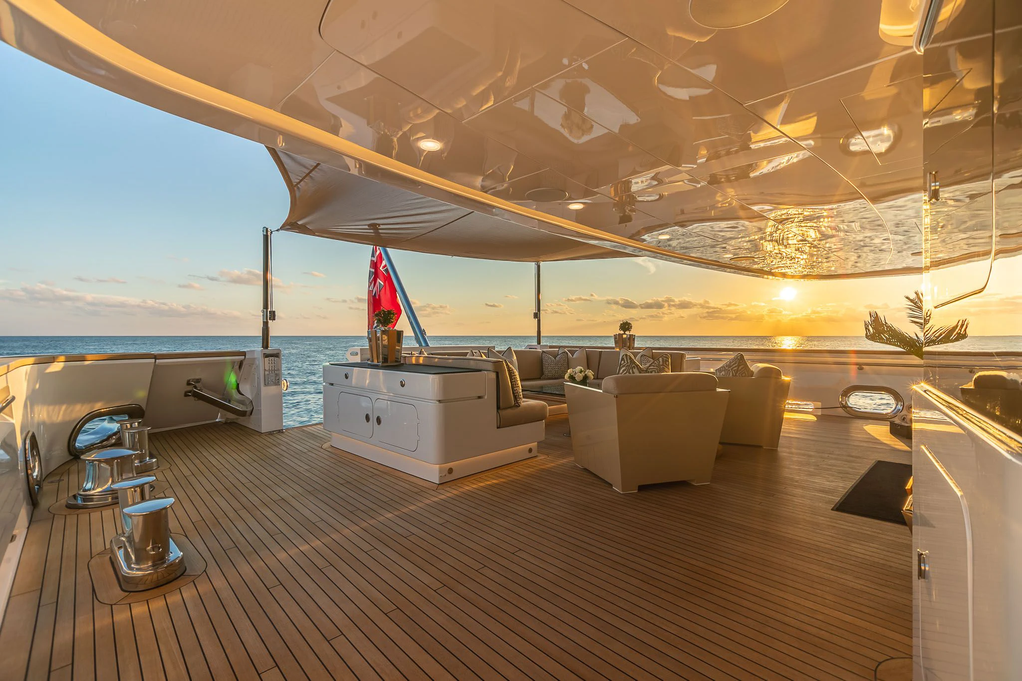 a large room with a boat and a couch aboard SEALION Yacht for Sale