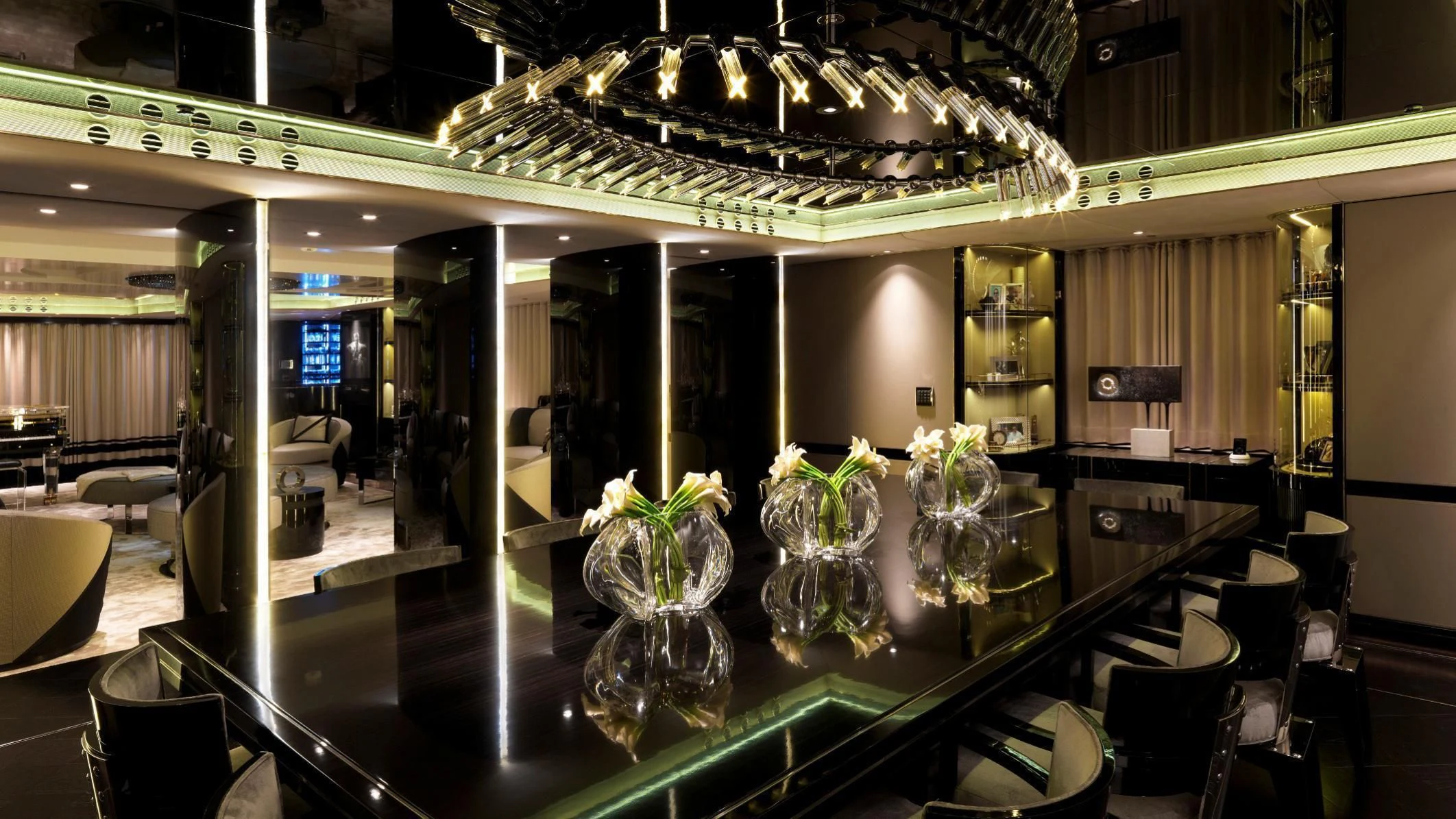 a room with a table and chairs aboard SEALION Yacht for Sale