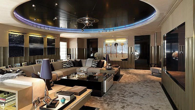 a living room with a large screen aboard SEALION Yacht for Sale