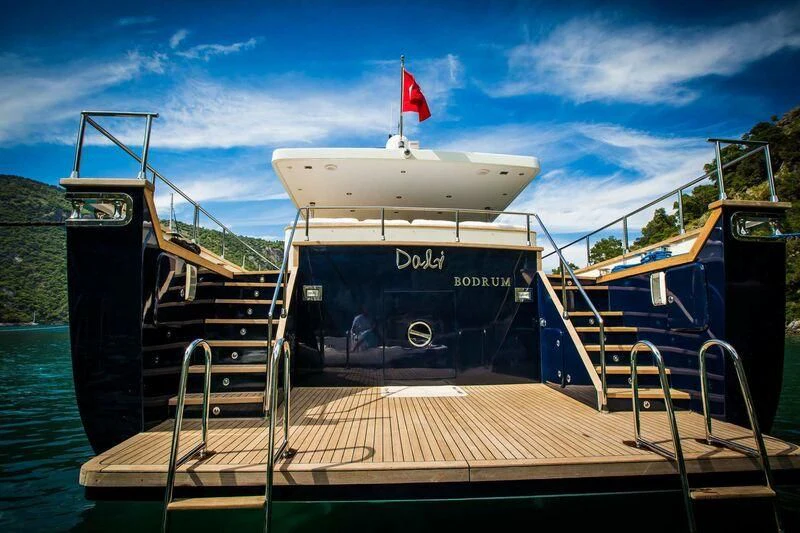 a boat on a dock aboard DALI Yacht for Sale
