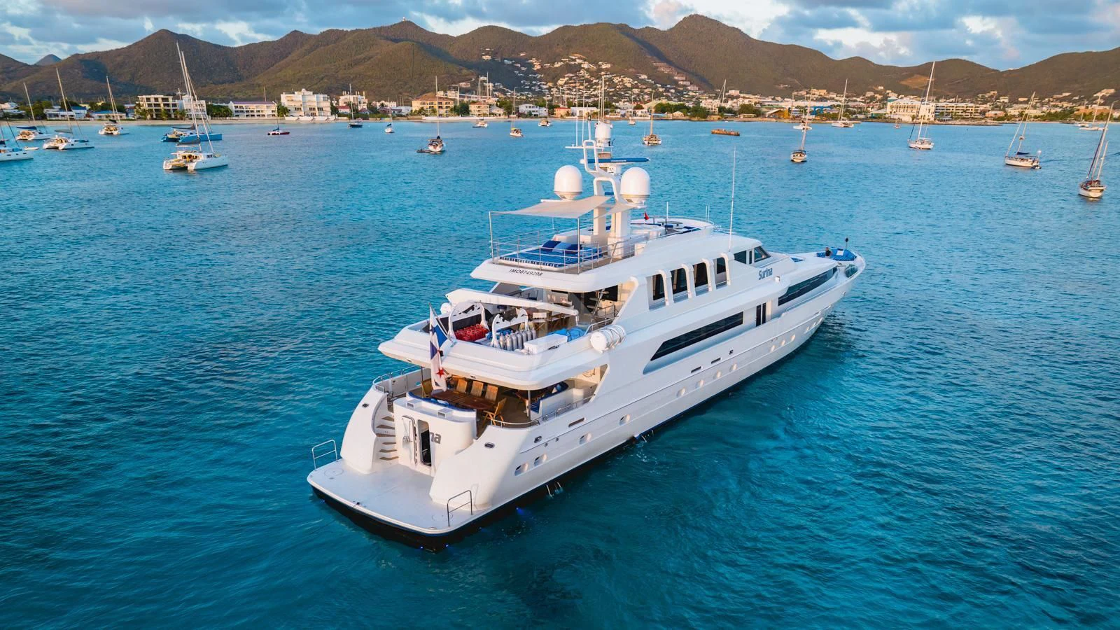 a white boat in the water aboard SURINA Yacht for Sale