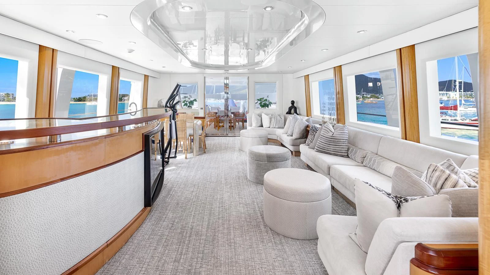 a large living room with a large window aboard SURINA Yacht for Sale