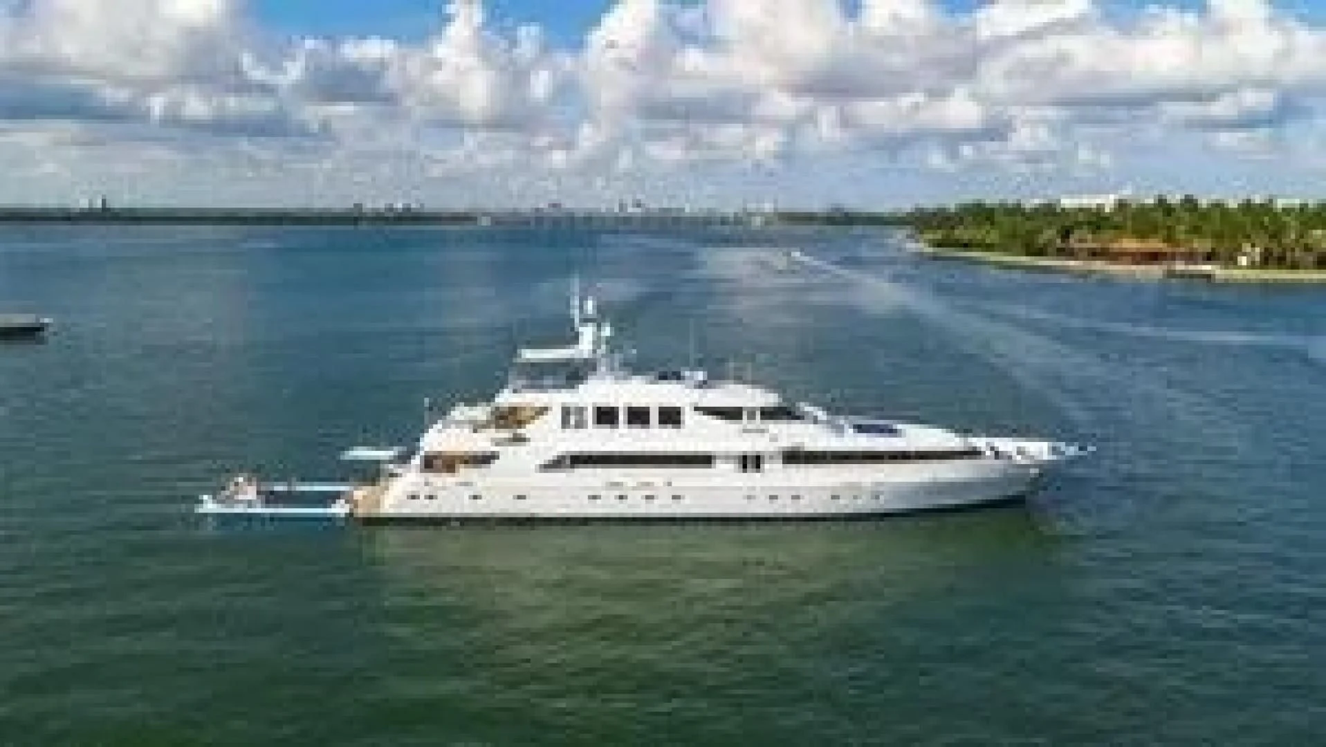 a white yacht in the water aboard SURINA Yacht for Sale