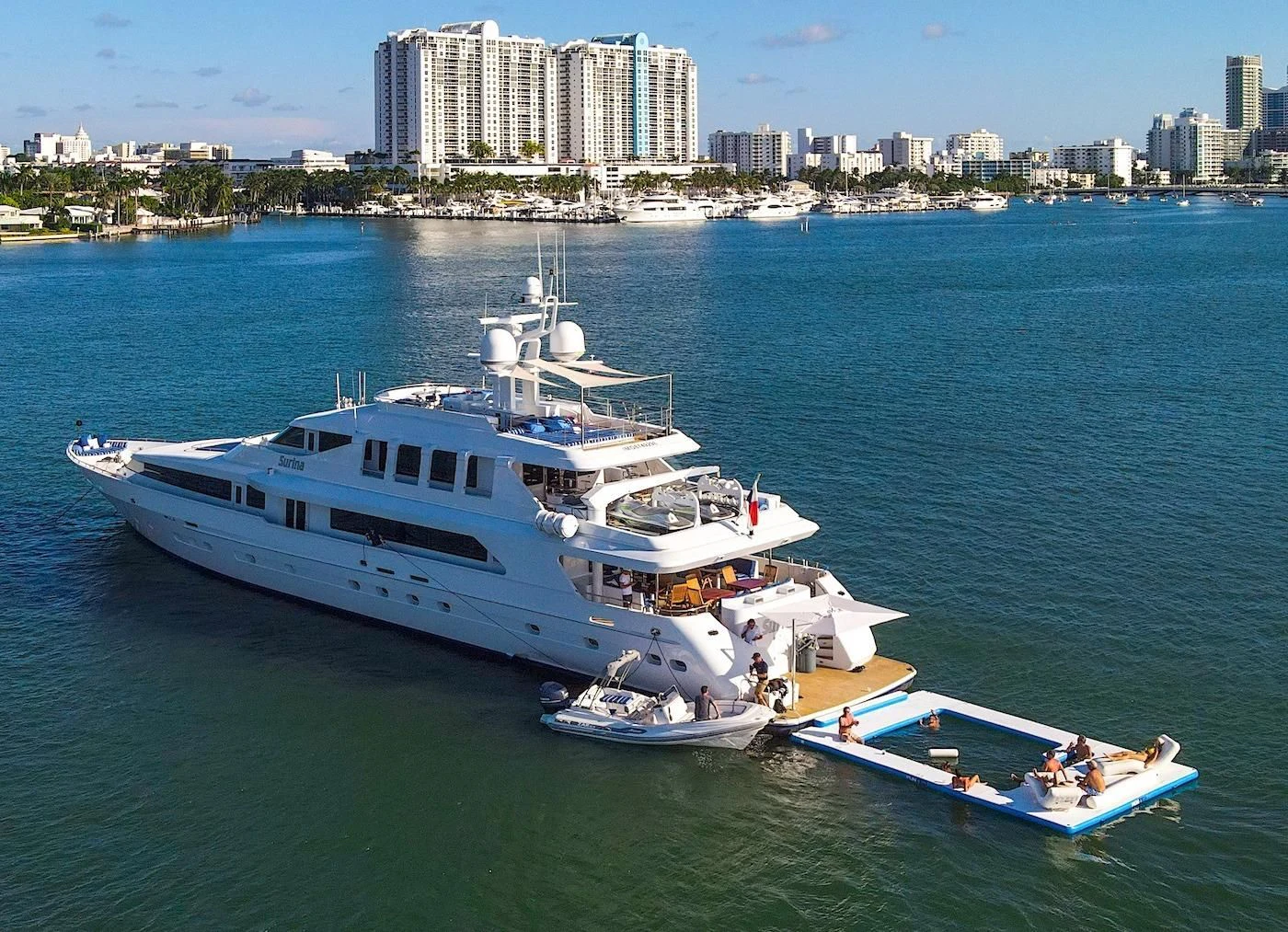 a large white boat in the water aboard SURINA Yacht for Sale