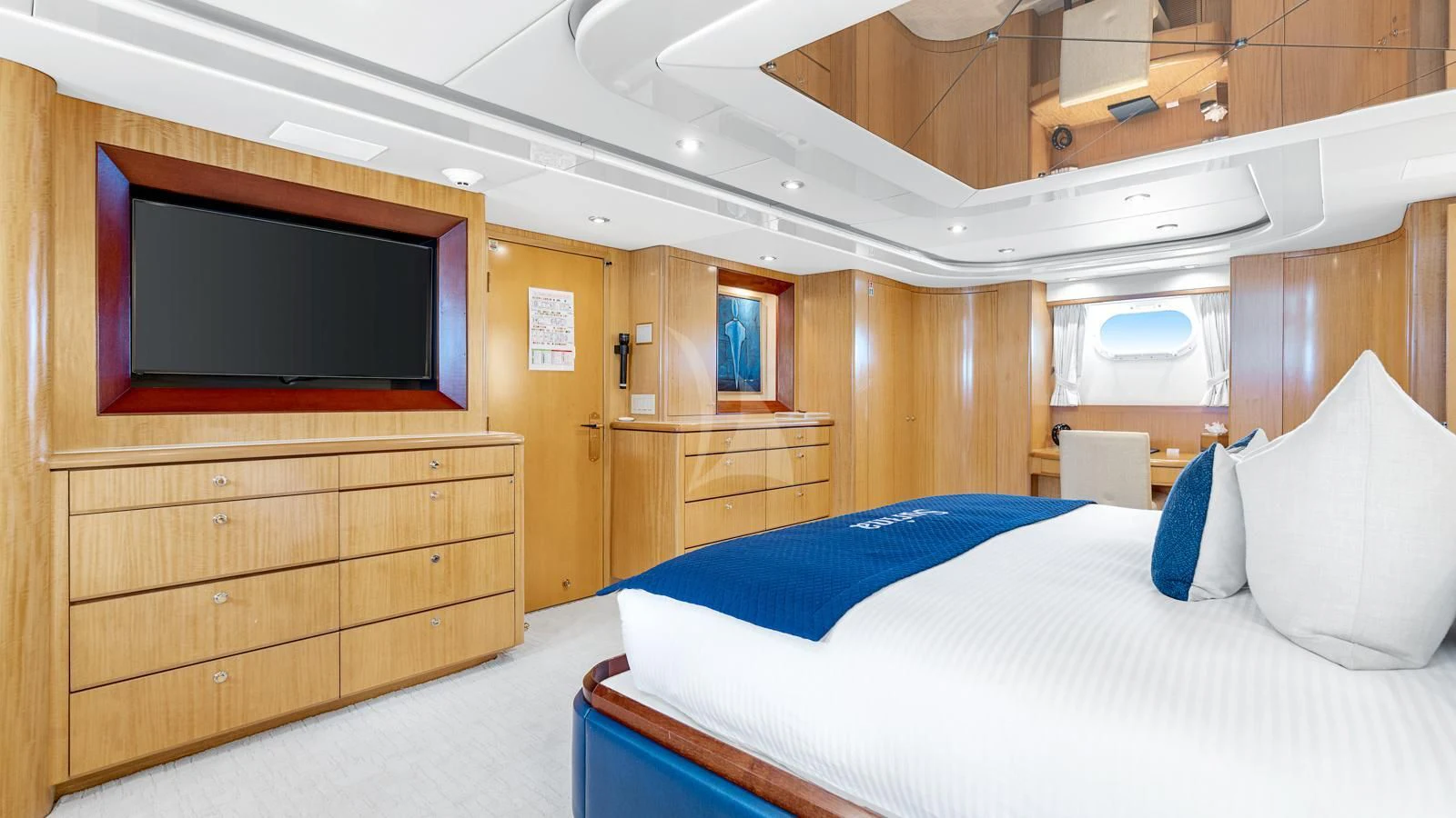a room with a bed and a tv aboard SURINA Yacht for Sale