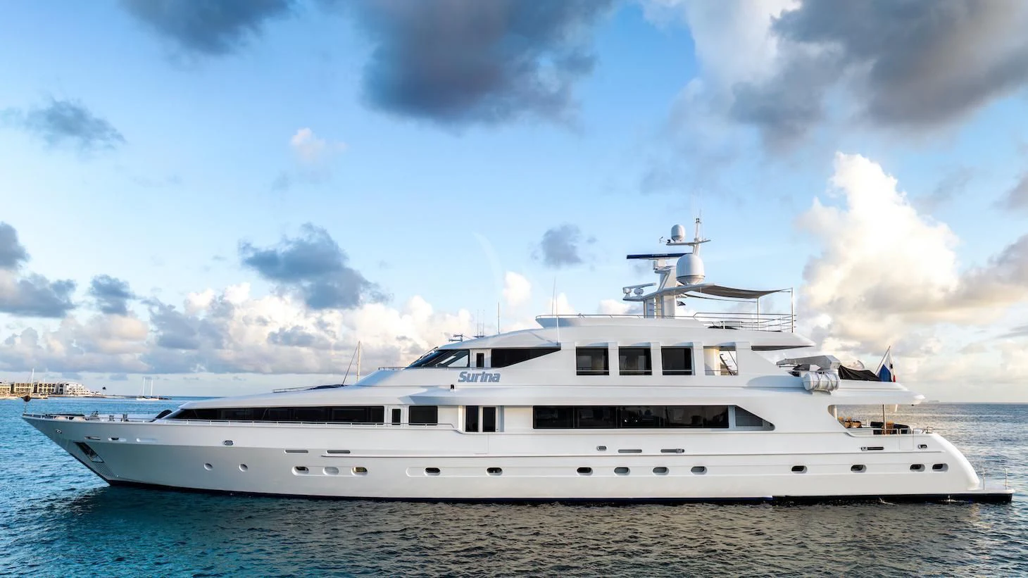 a white yacht in the water aboard SURINA Yacht for Sale