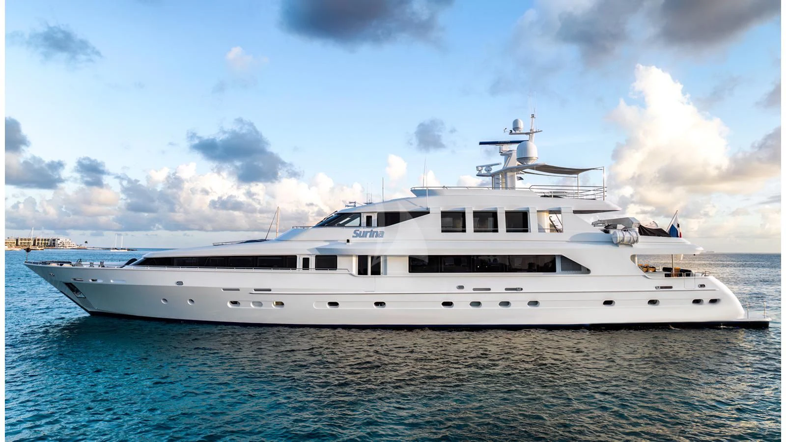 a large white yacht in the water aboard SURINA Yacht for Sale