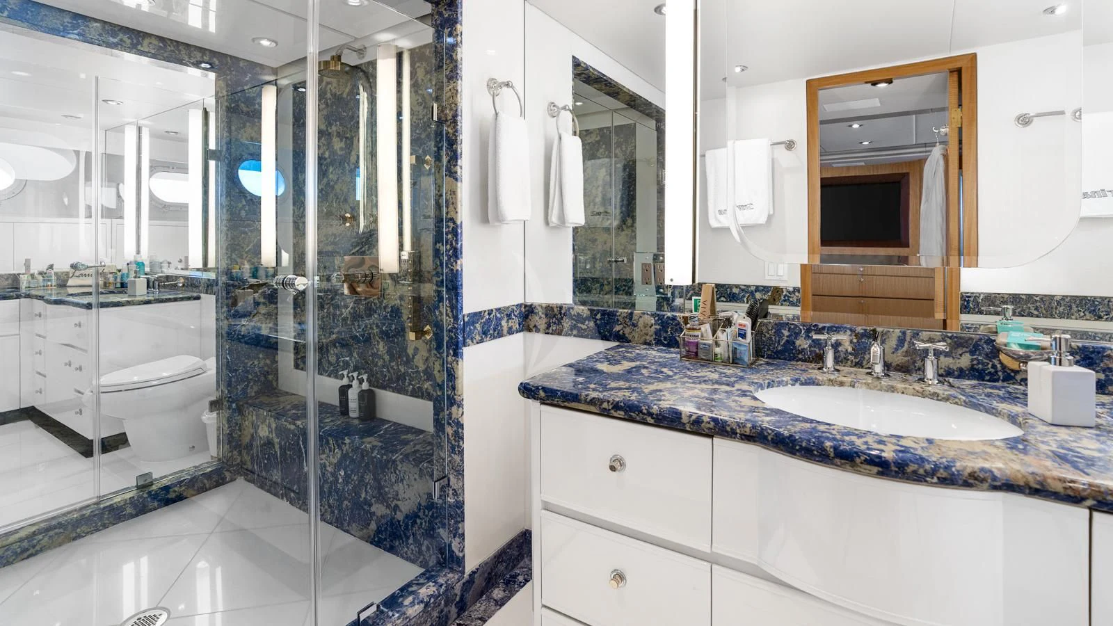 a bathroom with a shower and a sink aboard SURINA Yacht for Sale