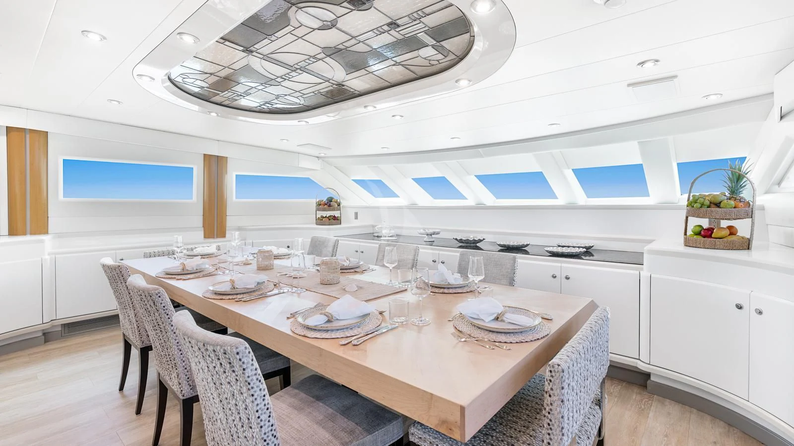 a dining table in a kitchen aboard SURINA Yacht for Sale