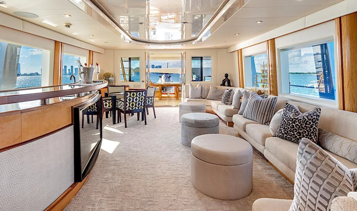 a living room with a large window aboard SURINA Yacht for Sale
