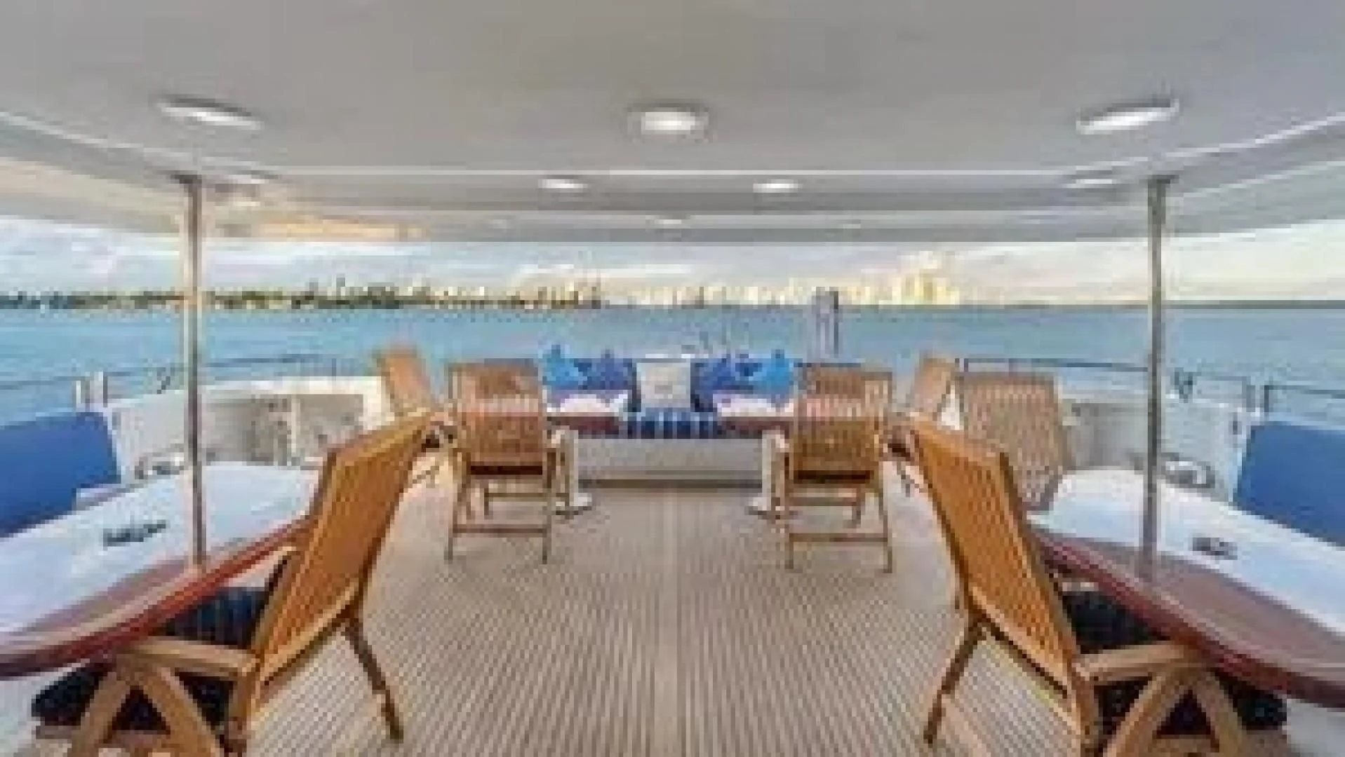 a room with chairs and tables aboard SURINA Yacht for Sale