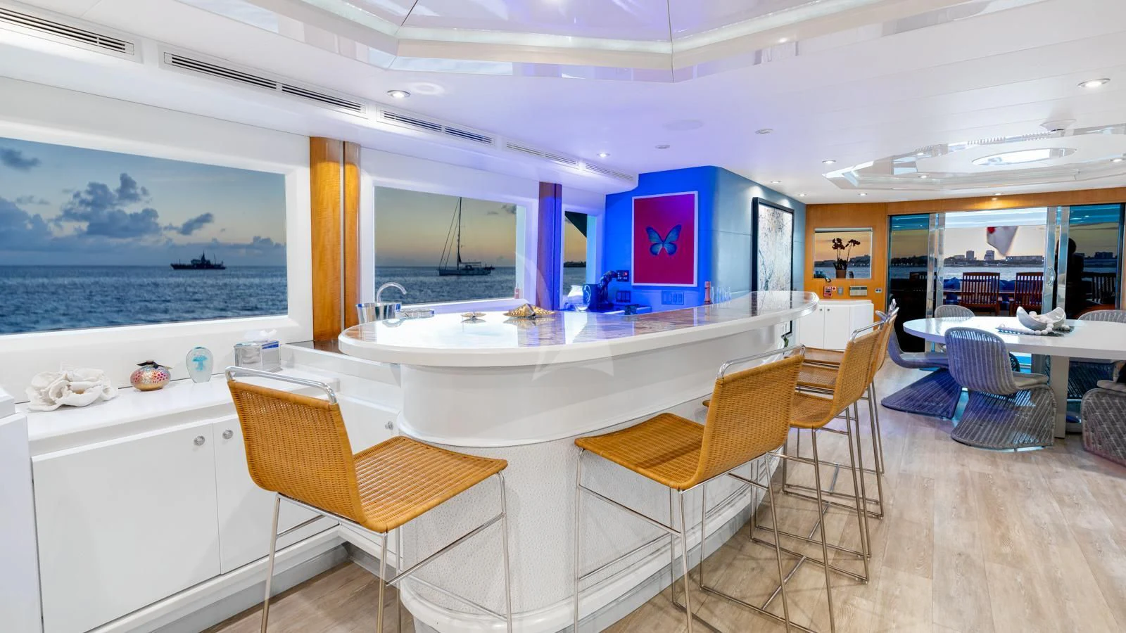 a large kitchen with a table and chairs aboard SURINA Yacht for Sale