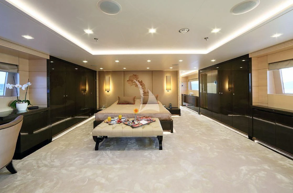a large living room with a large bed aboard EGO Yacht for Sale