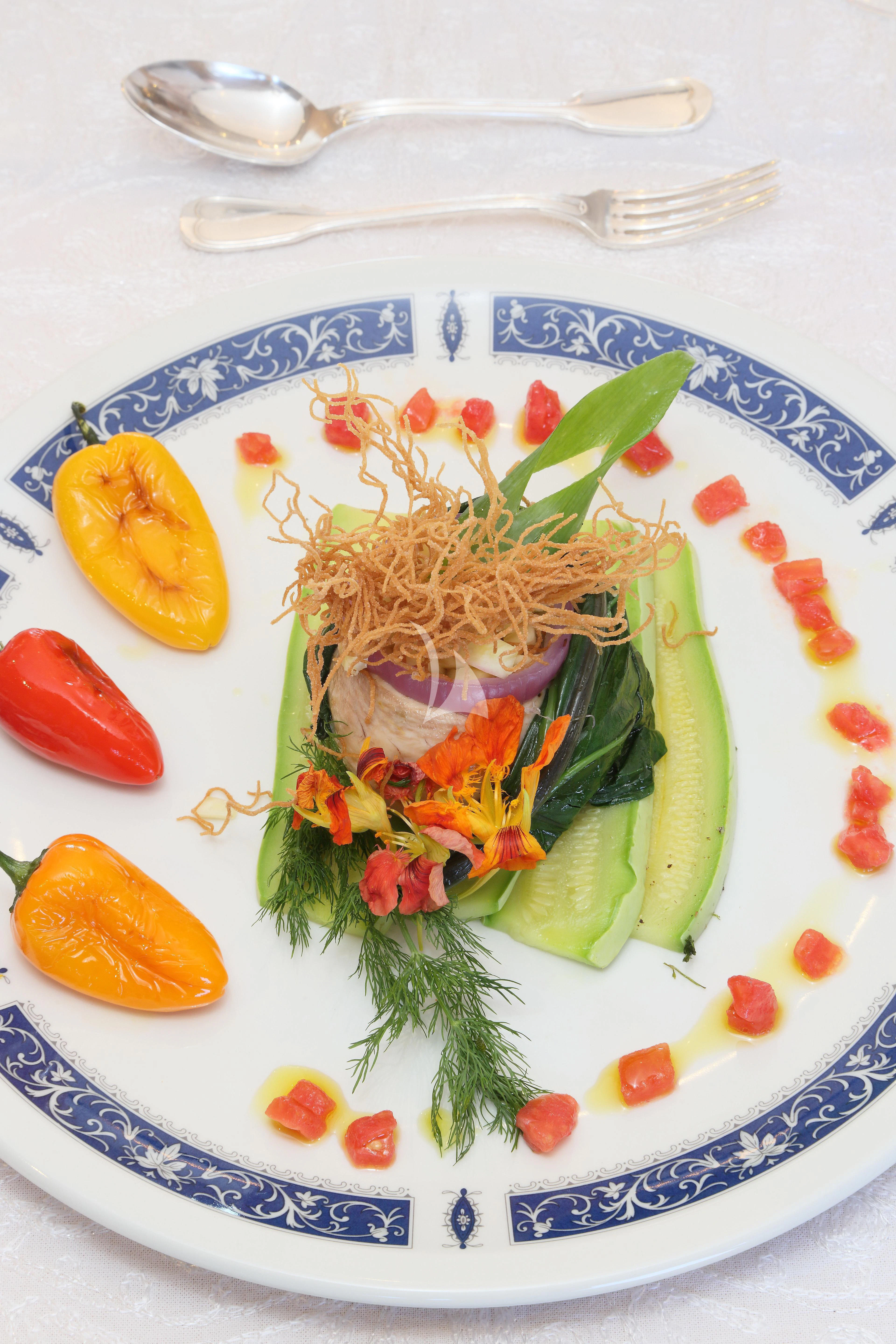a plate with food on it aboard EGO Yacht for Sale