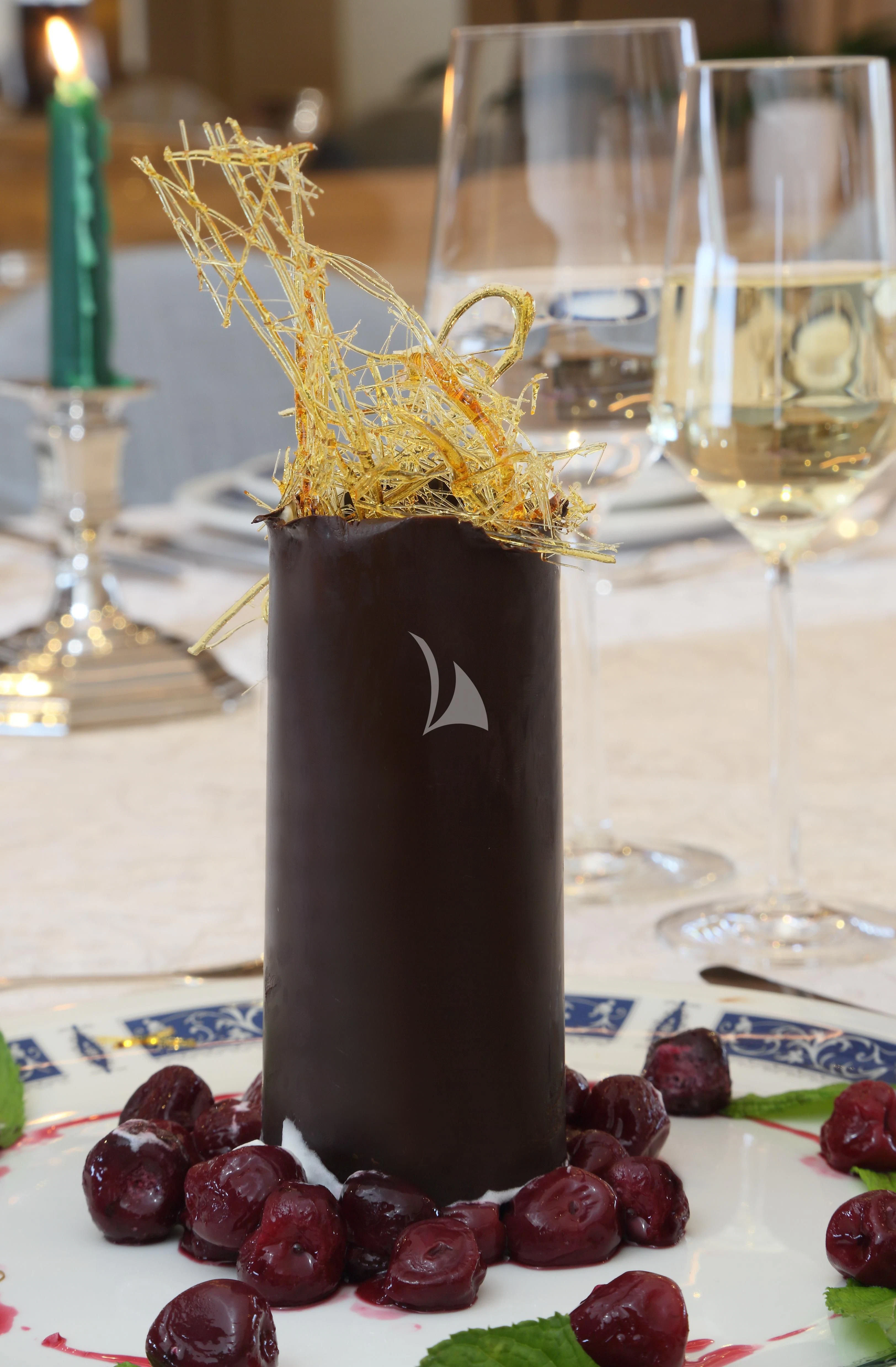 a candle with a number on it aboard EGO Yacht for Sale