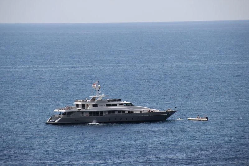 a large ship in the water aboard EGO Yacht for Sale