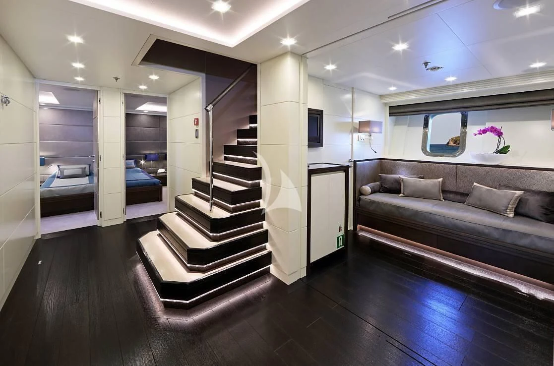 a staircase in a room aboard EGO Yacht for Sale