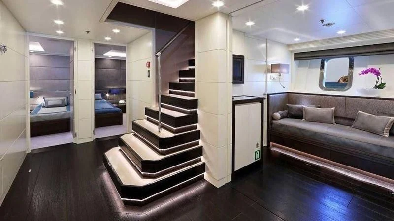 a staircase in a room aboard EGO Yacht for Sale