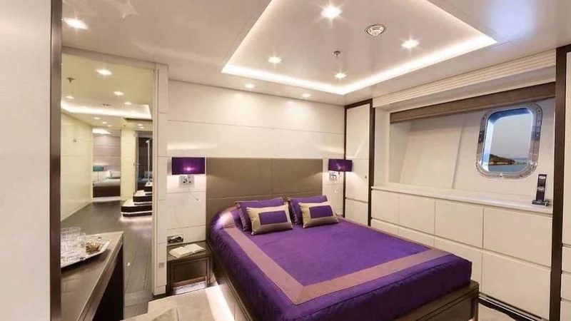 a bed in a room aboard EGO Yacht for Sale