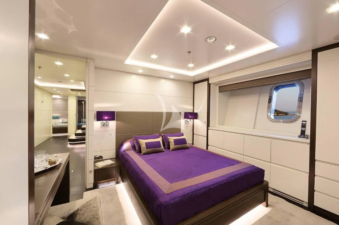 a bed in a room aboard EGO Yacht for Sale