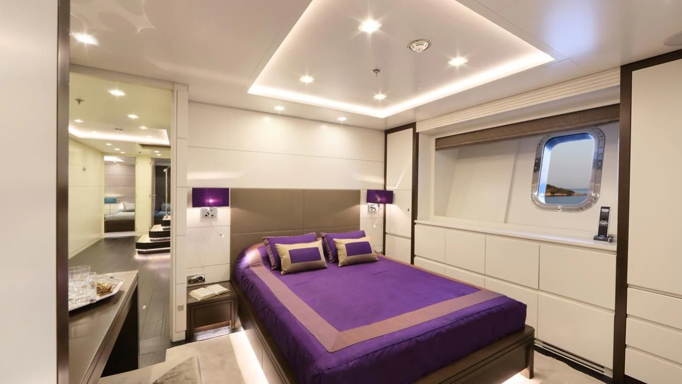 a bed in a room aboard EGO Yacht for Sale