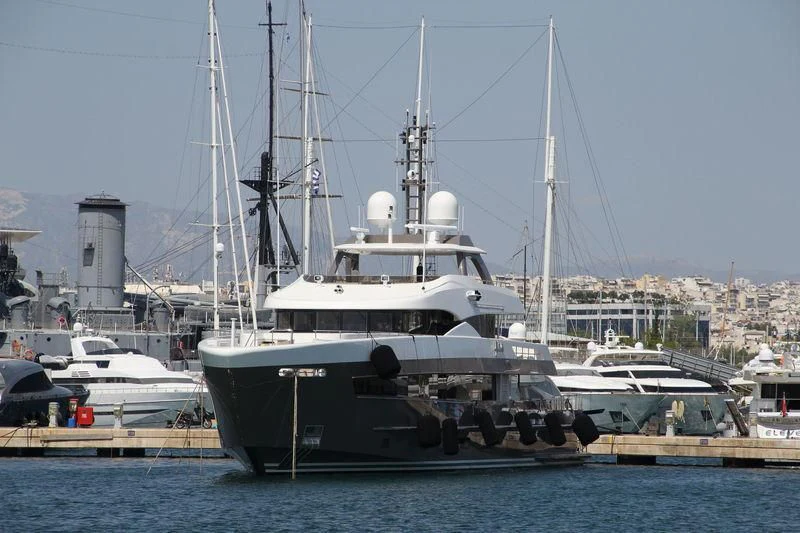 a boat docked at a pier aboard ARES Yacht for Sale