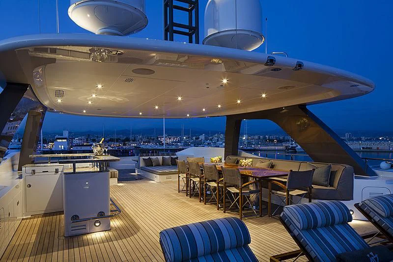 a large airplane with chairs and tables aboard ARES Yacht for Sale