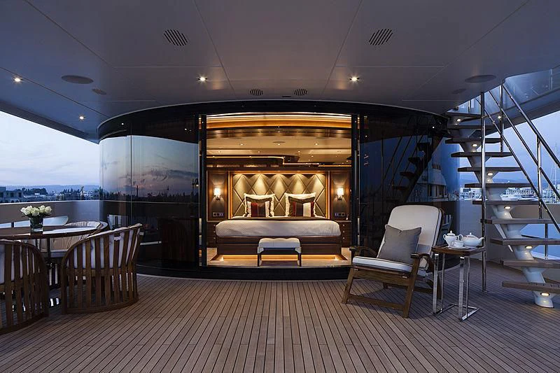a room with a couch and chairs aboard ARES Yacht for Sale