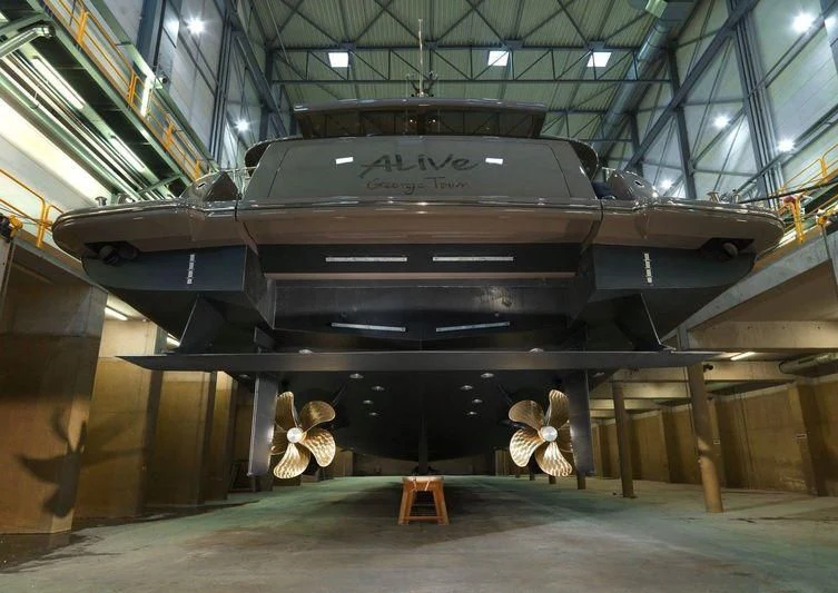 a large military tank in a museum aboard ARES Yacht for Sale