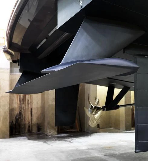 a large airplane in a museum aboard ARES Yacht for Sale