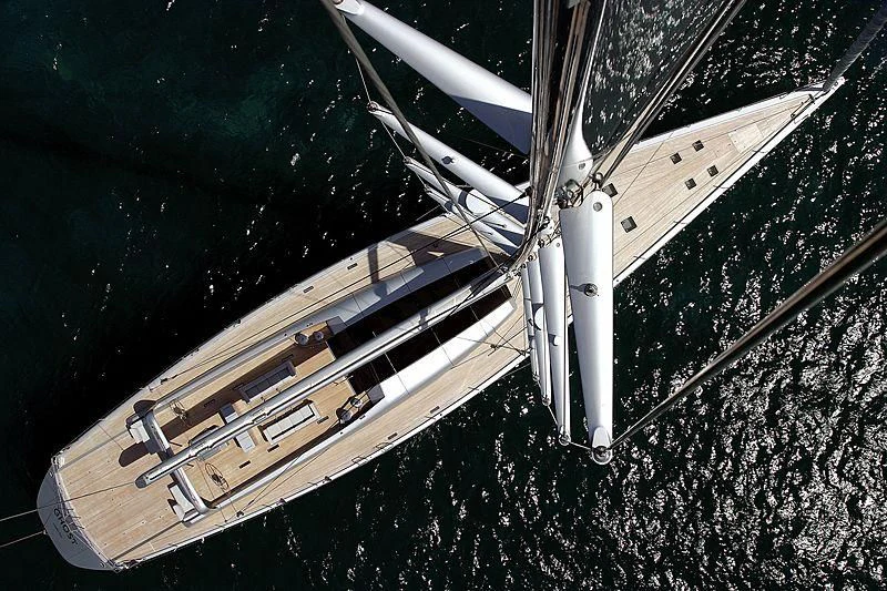 a satellite over a planet aboard GHOST Yacht for Sale