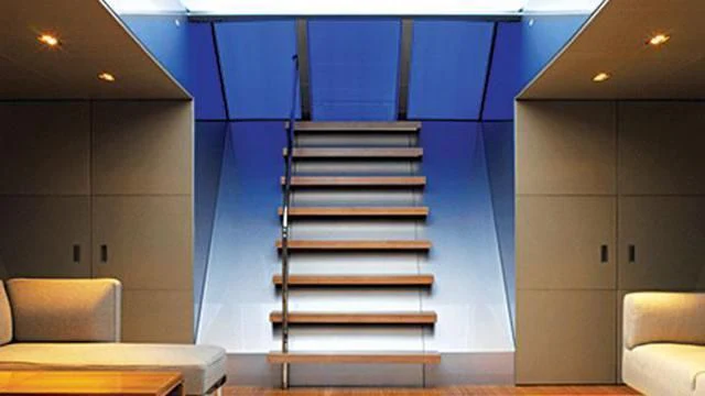 a set of stairs in a building aboard GHOST Yacht for Sale
