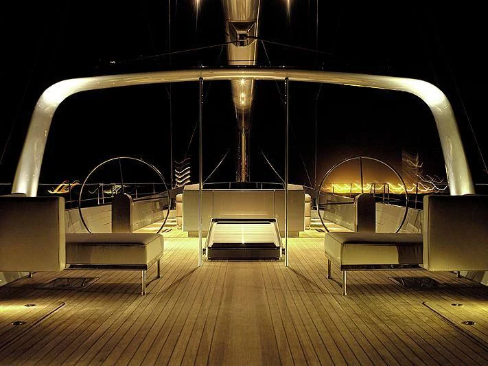 a room with a bench and a table aboard GHOST Yacht for Sale