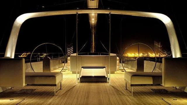 a room with a bench and a large round structure aboard GHOST Yacht for Sale