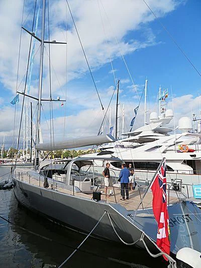 a boat with a flag on it aboard GHOST Yacht for Sale