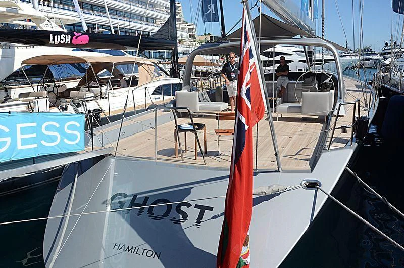 a boat with a flag on the front aboard GHOST Yacht for Sale