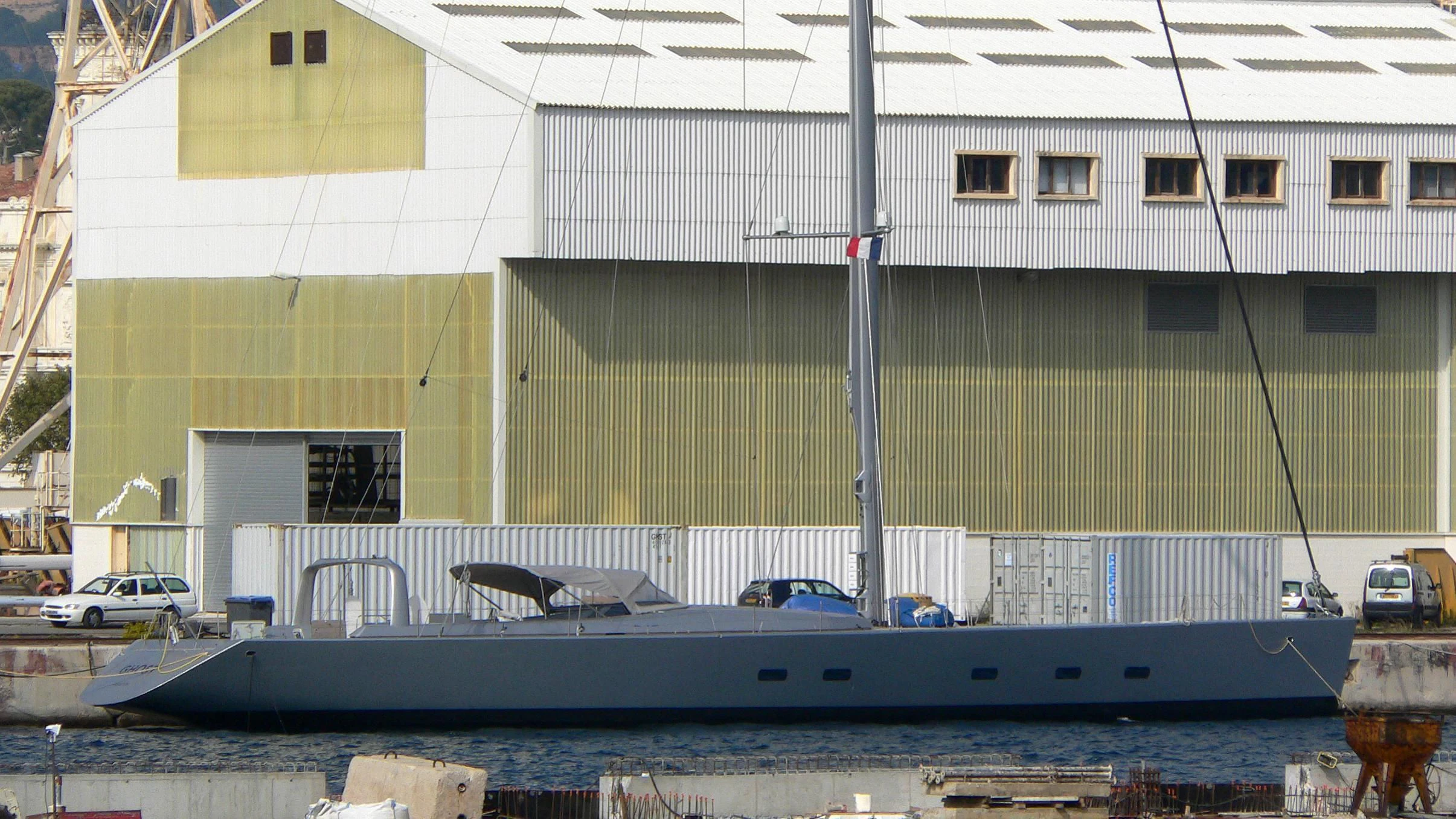 a boat docked in a harbor aboard GHOST Yacht for Sale