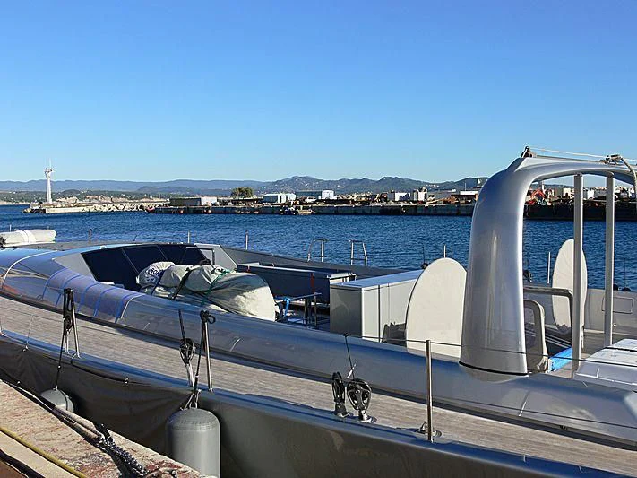a boat is parked on the water aboard GHOST Yacht for Sale